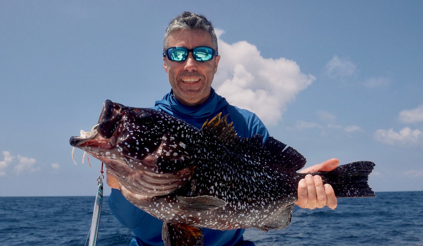Spot grouper jigging Lamu Island Kenya offshore November 2025 Segis Sparidae